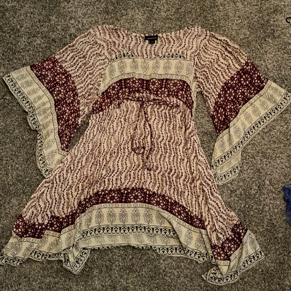 Short dress. It’s cream, black and a dark red